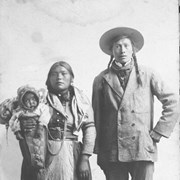 Cover image of Mary (Ear) Kootenay Sr. holding baby (possibly Douglas), and Joe Kootenay Sr., Stoney Nakoda